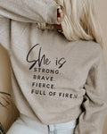 She Is Strong Brave Fierce Full Of Fire Crew Sweatshirt- light pink.